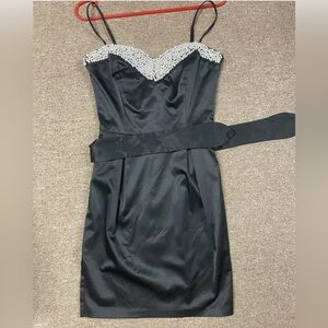 women's cocktail dress with straps and belt.
